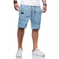 Short de plage bleu clair décontracté pour homme, tissu tissé confortable pour le sport estival. - S / Bas / Bleu clair