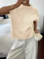 Pull-over beige à manches courtes avec élégant motif floral en relief pour femmes. - S / Abricot