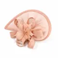 Detail shot of vintage pink fascinator hat with mesh and feather bow for wedding party. - Nude Pink