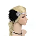 Vintage 1920s feather headband with sparkling rhinestones and black feathers for party wear. - Black