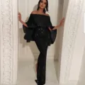 Elegant black glitter off-shoulder evening dress with stunning ruffles and split silhouette. - S / Dresses / Black