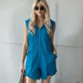 Close-up of sleeveless hooded zipper jumpsuit detail in blue imitation linen fabric. - S / Set / Blue
