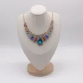 Gorgeous rhinestone statement necklace with colorful crystals and elegant gold chain design. - L / Beige