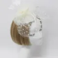 Bridal white mesh fascinator hat with polka dot veil and feathers for wedding party photo shoot - Off White