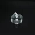 Acrylic ring display stand detail view, transparent cylindrical base for jewelry photography and storage. - Transparent Round Base