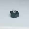 Clear acrylic ring holder with black hexagonal base detail view for jewelry display and photography. - Black Hexagonal Base