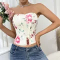 Close-up detail of floral print strapless corset top, featuring delicate watercolor flowers. - S / Print