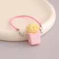 Lindo llavero colgante de cubo de palomitas mini con cordón rosa y cierre de mosquetón práctico. - Llavero de Palomitas Rosa