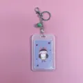 Transparent PVC card holder with cute cartoon insert, metal keyring and green bell for daily use. - 2 Girl with Pillow