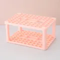 Organizzatore da scrivania rosa a fessure multiple, ideale per pennelli, penne e piccoli oggetti. - Rosa