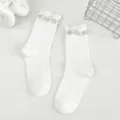 White mid-tube socks for women with pearl and rhinestone cuff details. Cozy and stylish daily wear. - One Size (EU 34-39) / White