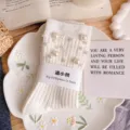 White mid-calf socks for women featuring elegant pearl beaded decorations, cozy cotton knit design. - One Size (EU 34-39) / White