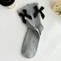 Grey knit mid-calf socks featuring black bow and pearl decoration, sweet style variant. - One Size (EU 34-39) / Light Gray