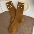Caramel brown ribbed knit mid-tube socks featuring elegant faux pearl embellishments. - One Size 34-39 / Turmeric