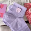 Purple ribbed short socks with cute bear button, soft and breathable for daily wear. - One Size / Light Purple with Pink Buttons