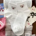White mesh short socks featuring rhinestone bee design, cute and versatile for sweet style. - White