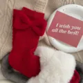 Red knit mid-calf socks for women featuring a cute sweet bow, perfect for winter and holiday gifts. - Twisted Bowknot