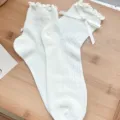 Sweet white ruffled mesh socks with cute bowknot and heart charm for JK lolita style fashion. - One Size 34-39 / Wavy Side Bow