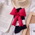 Black ribbed slouch socks featuring a bold detachable red stuffed bow for stylish autumn wear. - One Size (EU 34-39) / Black Sock Red Bow
