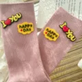 Pink ribbed mid-calf socks featuring cute silicone letter patches 'I LOVE YOU' and 'HAPPY DAY' for women. - One Size 34-39 / Pink
