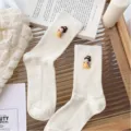 White ribbed mid-calf socks featuring cute Chinese ancient style Tang doll decors. - One Size (EU 34-39) / Cream White