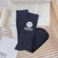 Black ribbed mid-calf women socks with cute smiley face patch and happy letter styling. - One Size (EU 34-39) / Black