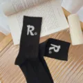 Black mid-calf crew socks for women featuring rhinestone letter R silicone patch, stylish cozy knit. - One Size 34-39 / Black