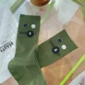 Green stackable mid-tube socks featuring cute smiley faces and unique number prints for autumn. - One Size 34-39 / Army Green