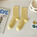 Solid color yellow mid-tube ribbed socks for women, minimalist daily casual wear. - Yellow