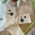 Beige mid-tube socks for women, featuring cute smiley face prints and number graphics for daily wear. - One Size 34-39 / Khaki