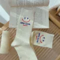 White ribbed mid-calf socks featuring cute smiley face and trendy letter print daily. - One Size 34-39 / Milk White