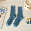 Classic blue ribbed mid-calf socks for women, stylish solid color cotton knit casual daily wear. - Blue