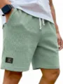 Herren lässige Waffelstrick Shorts mit Kordelzug und praktischen Taschen für den Sommer. - S / Hellgrün