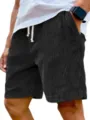 Men's casual corduroy shorts in black with adjustable drawstring waistband and convenient side pockets. - S / Black