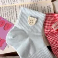Cute light blue cotton short socks featuring a sweet bear button, breathable mesh design for women. - One Size / Light Blue with Beige Buttons