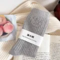 Grey ribbed mid-tube socks featuring sparkling rhinestone smiley face design for women. - One Size (EU 34-39) / Light Gray