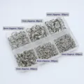 Detailed view of 6-grid jump rings set with assorted sizes from 3mm to 8mm for DIY jewelry making. - White K/Silver