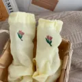 Light yellow mid-calf socks for women featuring cute tulip embroidery and rolled cuffs design spring. - One Size 34-39 / Yellow