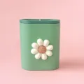 Green desk pen holder with white daisy, dual compartment stationery organizer for office. - Sunflower
