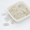 Close-up view of bamboo joint glass beads with gold foil, perfect for DIY ancient style jewelry. - 6x12mm Hole Approx 1mm / White Gold Threads