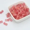 Pink bamboo-shaped glass beads with gold speckles, perfect for handmade DIY jewelry bracelets making. - 6x12mm Hole Approx 1mm / Red Gold