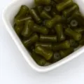 Olive green glass bamboo spacer beads for handmade DIY bracelets and hair accessories. - 6x12mm Hole Approx 1mm / Olive Green