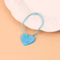 Llavero de cadena de cuentas azul claro con dije de corazón, accesorio de metal. - Azul