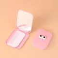 Set de espejo de maquillaje y peine plegable portátil con diseño de ojos de dibujos. - Rosa