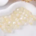 Close-up detail of Milky white glitter resin round beads for DIY jewelry making accessories. - No. 2