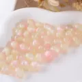 Primo piano di perline rotonde in resina con glitter fini, accessori per gioielli fai da te. - 8mm / N.3