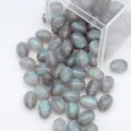 Vue détaillée de perles en résine ovale grise pailletées pour accessoires de bijoux de bracelet DIY. - 8x11mm / Gris