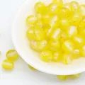 Yellow resin beads with gold foil and white stripe, close-up view of DIY craft jewelry parts. - 8mm / Aperture Approx. 1.6mm / Yellow