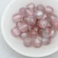 Pink cat eye loose beads detail shot, smooth surface and glowing light band for handmade jewelry. - 6. Dreamy Pinkish Grey