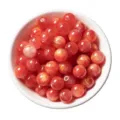 Red resin quicksand gold round beads close-up detail, perfect for DIY handmade jewelry. - Red